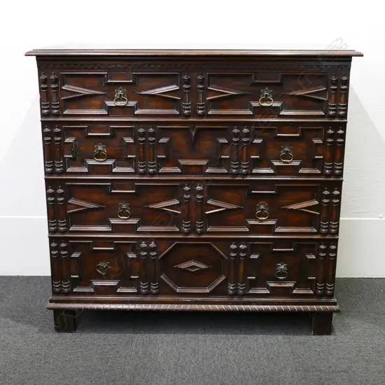 An oak William and Mary-style four drawer-chest
