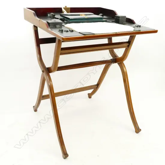 An 19thC mahogany campaign desk