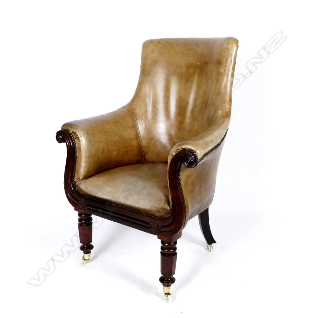 A Regency leather and mahogany library chair Image 1++