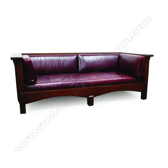 A mahogany American Arts & Crafts 'Mission Revival' style three seater sofa