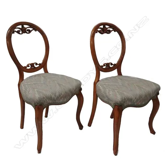 Eight Victorian mahogany balloon back chairs