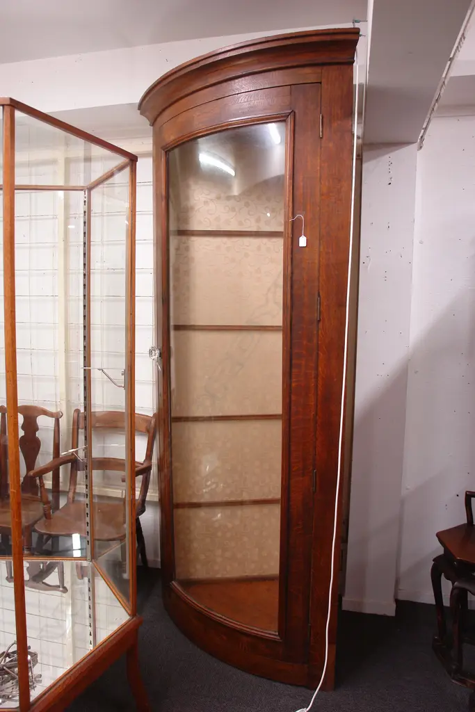 An uncommon Victorian tall oak corner fitting shop display cabinet Image 1++