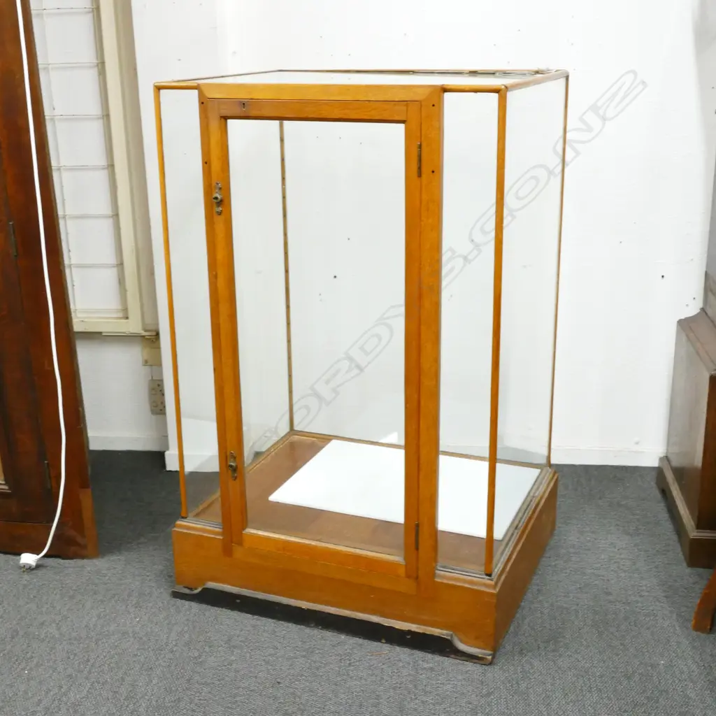 A 1920/1930s oak framed and glazed shop display cabinet Image 1++