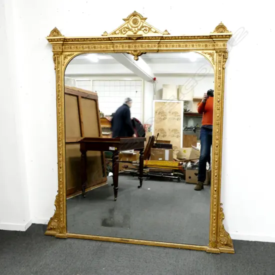 A large Victorian gilt framed overmantel mirror