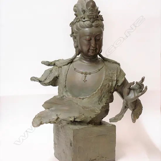 A Chinese bronze bust of Kwanyin