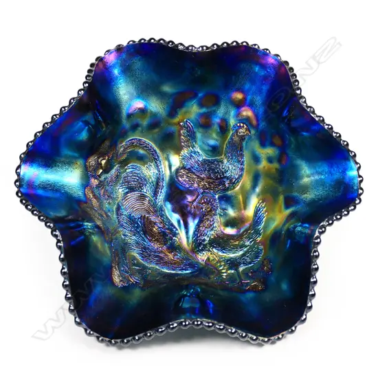 A rare Dugan carnival glass farmyard scene bowl,