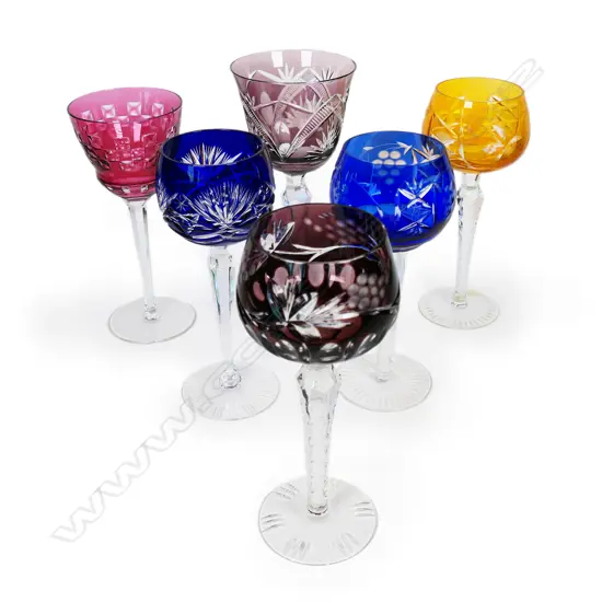 A harlequin set of six Bohemian long stemmed wine glasses,