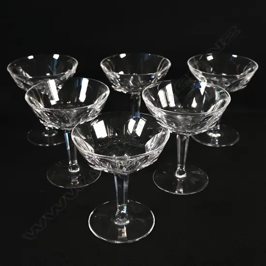 A set of six Waterford champagne glasses,