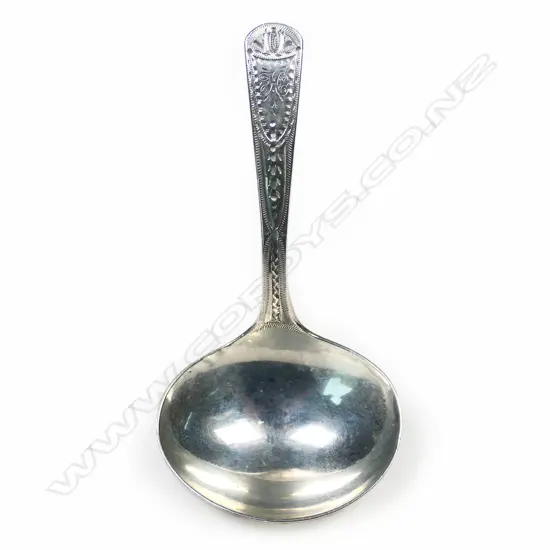 A George III silver caddy spoon,