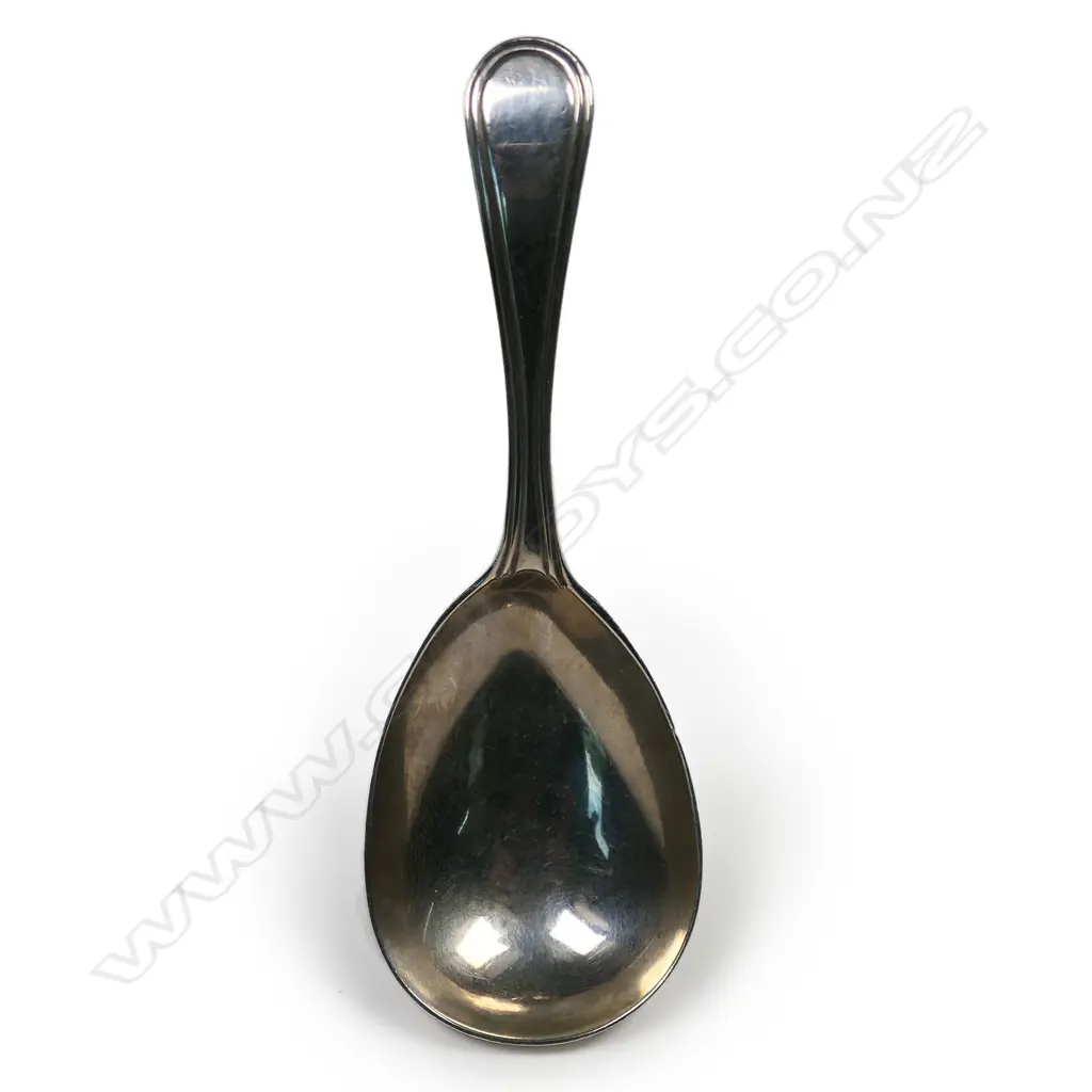A George III silver caddy spoon, Image 1++