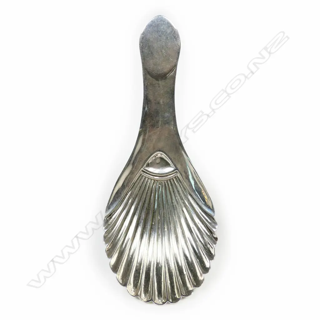 A George III silver caddy spoon, Image 1++