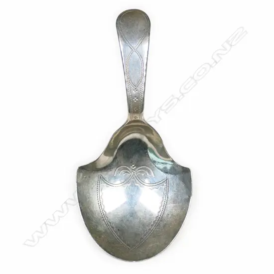 A George III silver caddy spoon,