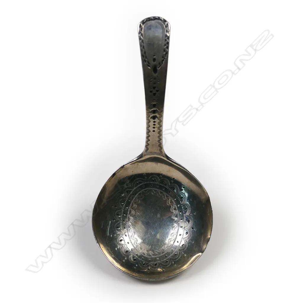A George III silver caddy spoon, Image 1++