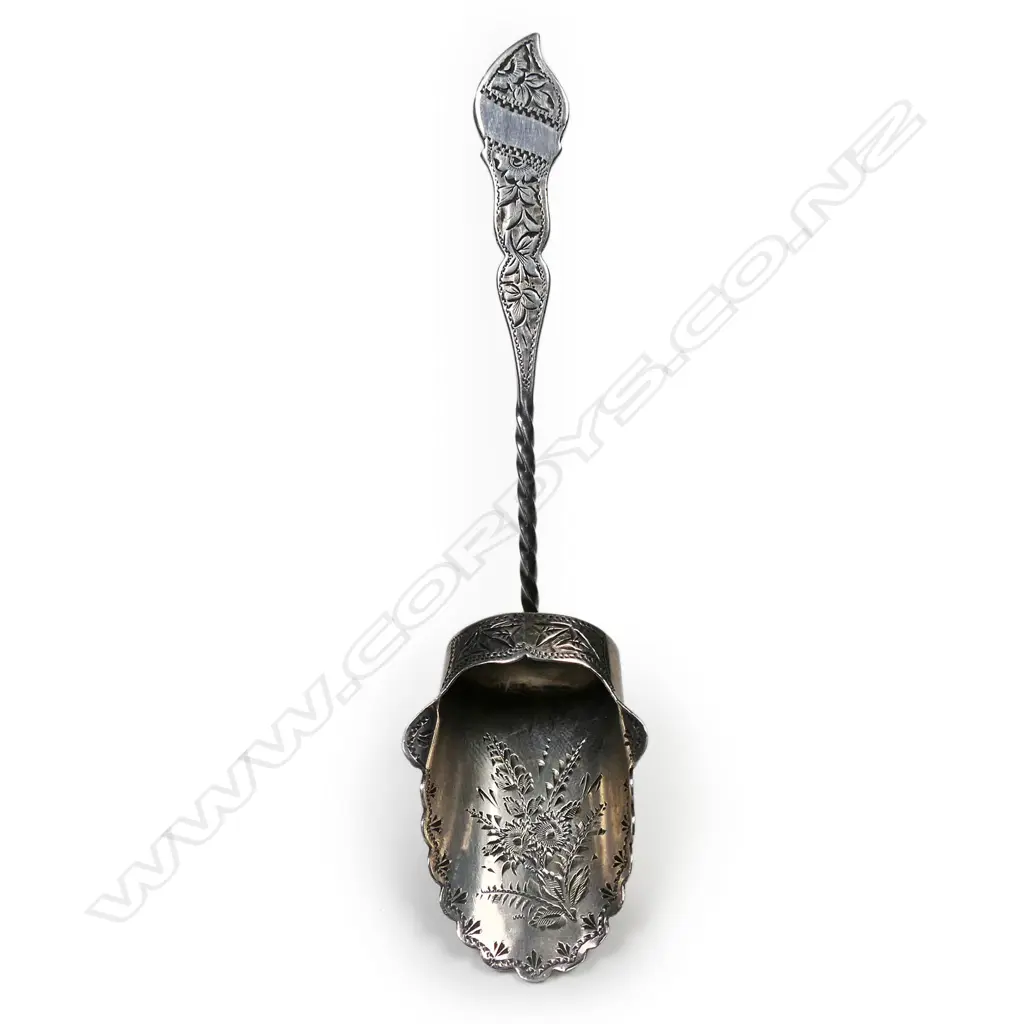 A Victorian silver engraved long handled sugar shovel, Image 1++
