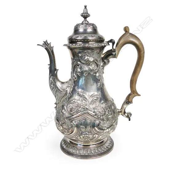 A George III baluster silver coffee pot with shell moulded spout,