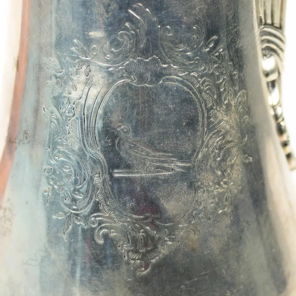 A George III silver hot water pot, Image 1++