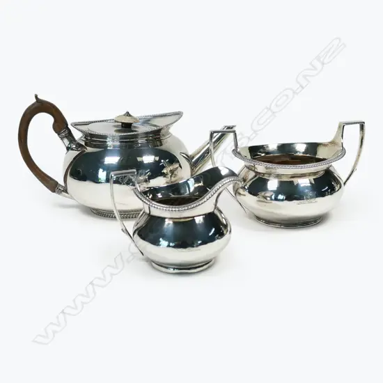 A George III silver three-piece tea set,