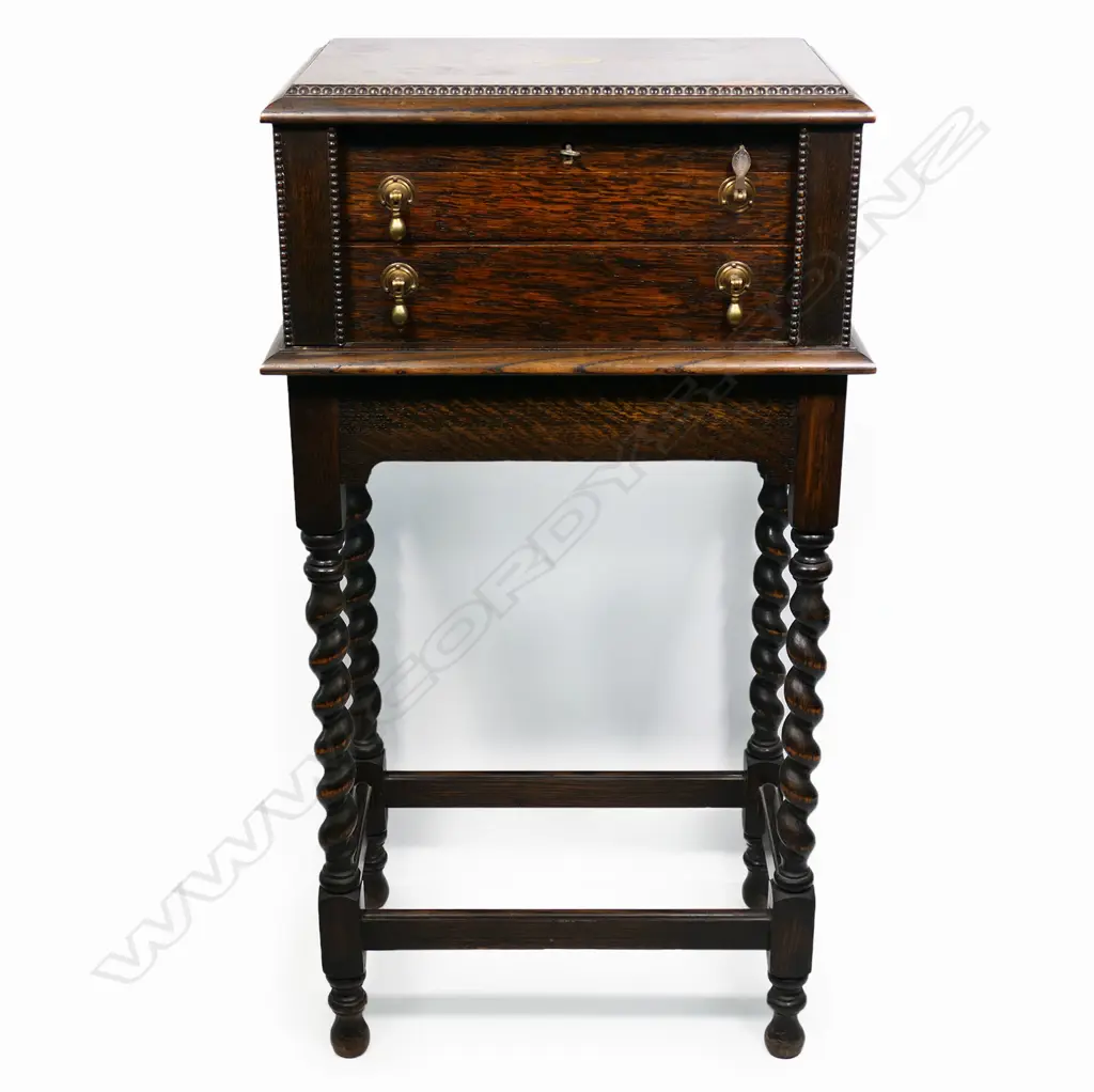 A twelve-place silver plate cutlery set in oak stand, Image 1++