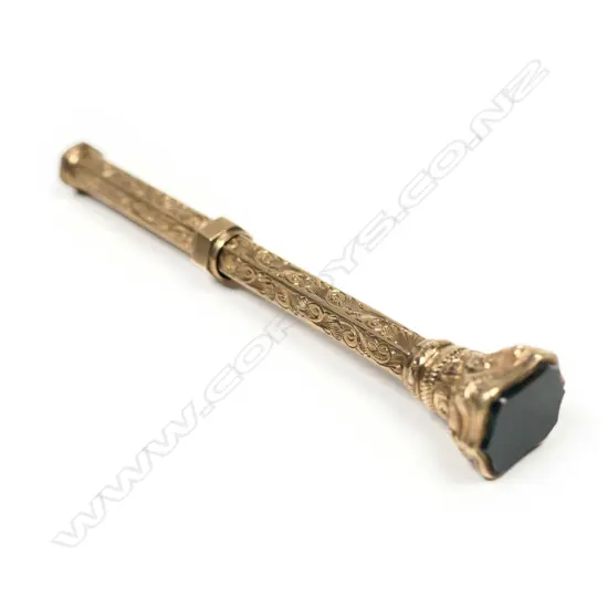 A Victorian 9ct yellow gold engraved propelling pencil,