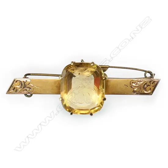 A George III intaglio cut citrine seal in 9ct bar brooch mount,