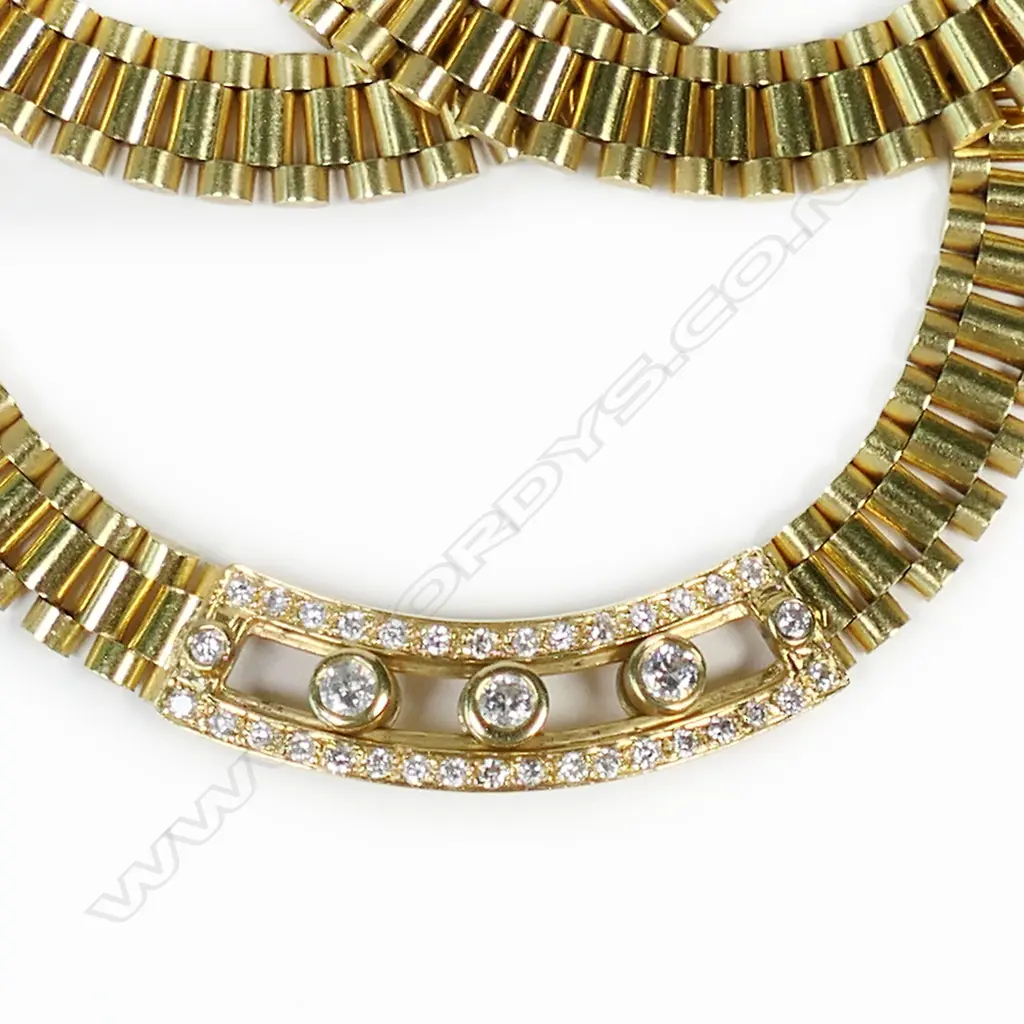 An 18ct yellow gold and diamond necklace, Image 1++