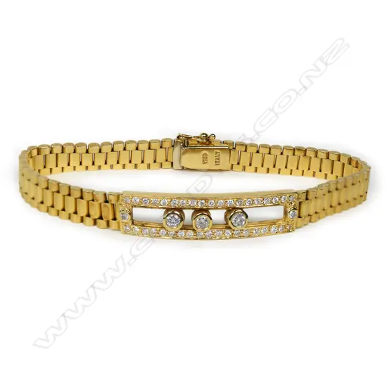 An 18ct yellow gold and diamond bracelet,