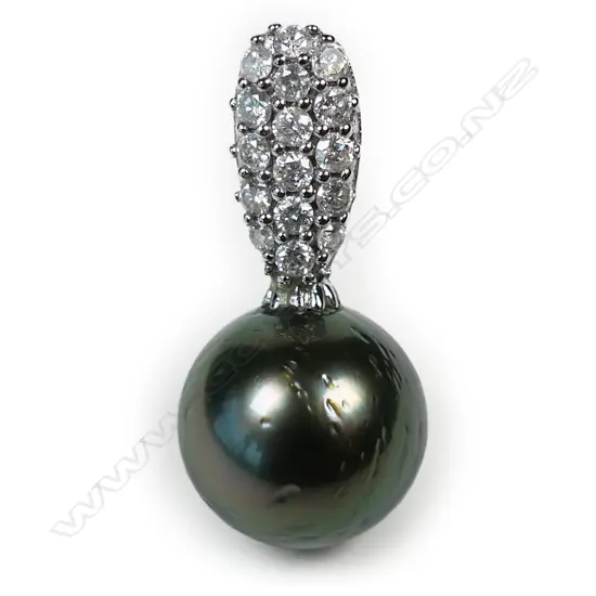 A 14ct white gold diamond and Tahitian pearl pendant,