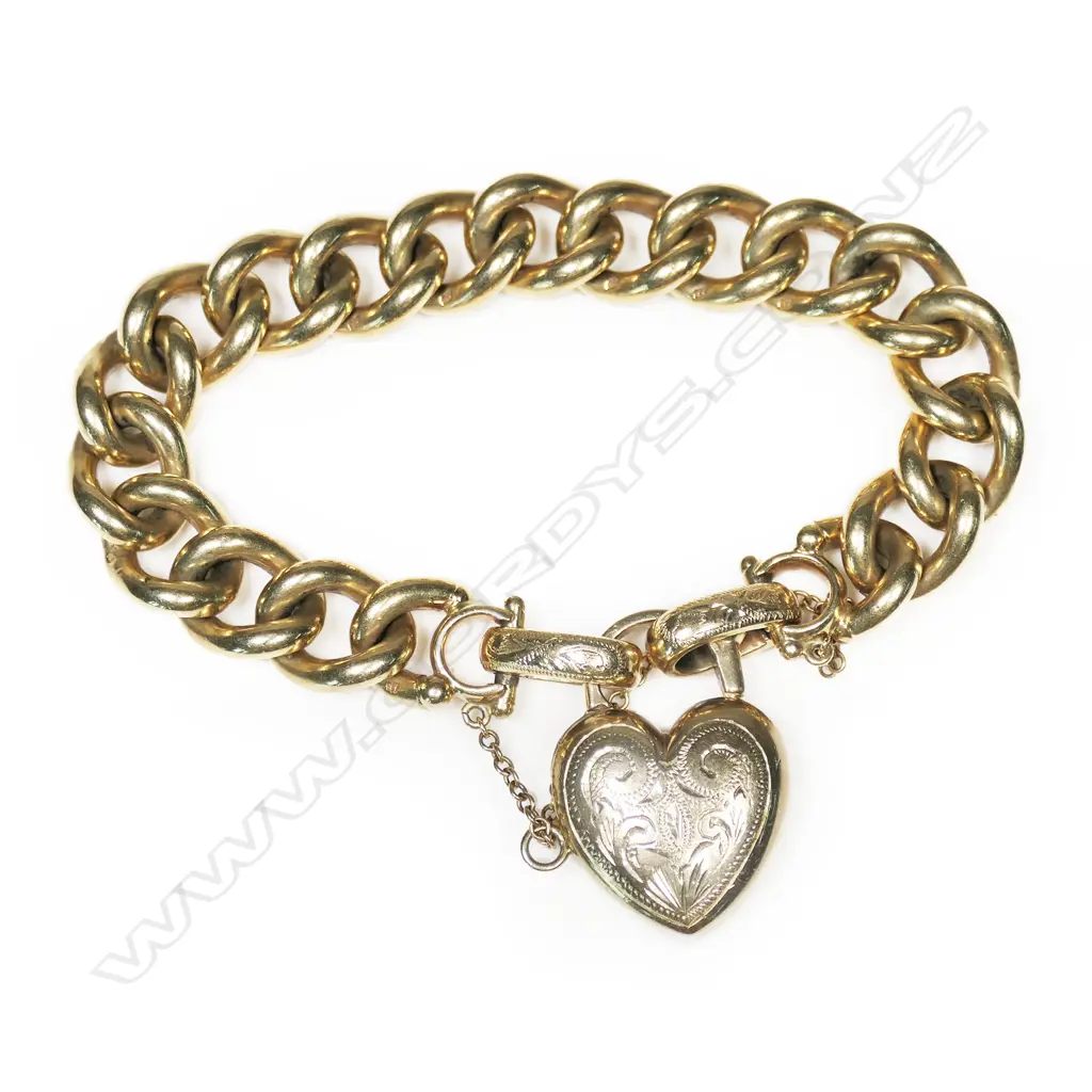 A heavy 9ct yellow gold curb link bracelet, Image 1++