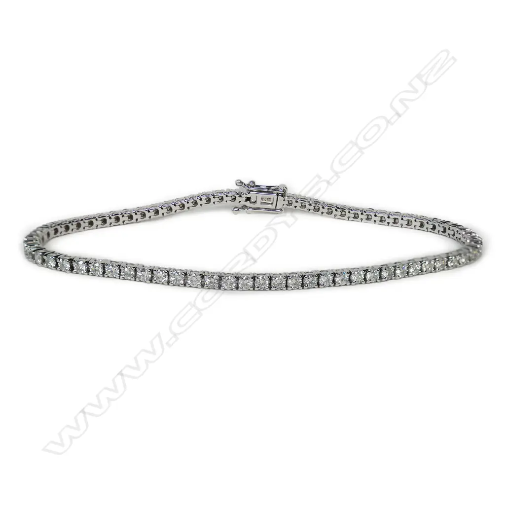 A 14ct white gold and diamond tennis bracelet, Image 1++