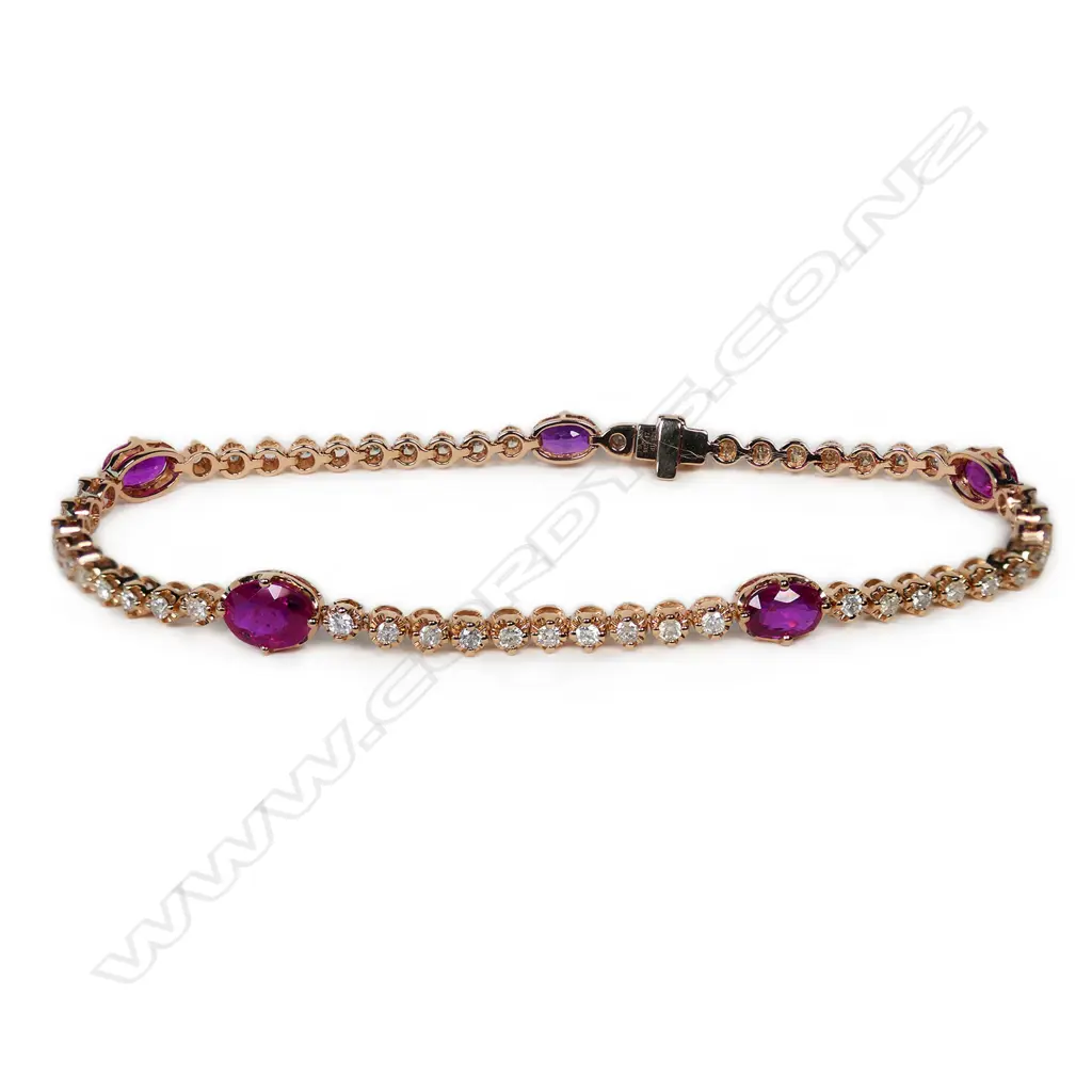 A 14ct rose gold diamond and ruby bracelet, Image 1++