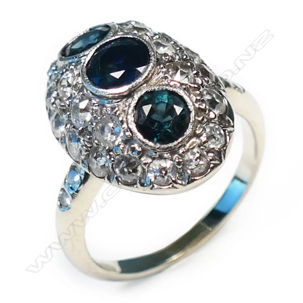 A 14ct white gold dome top sapphire and diamond ring, Image 1++