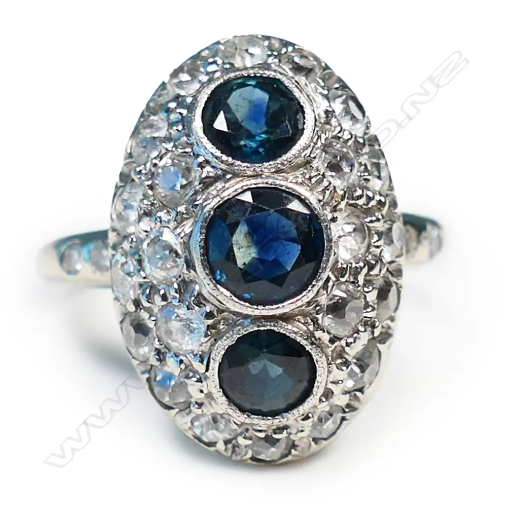 A 14ct white gold dome top sapphire and diamond ring, Image 1++