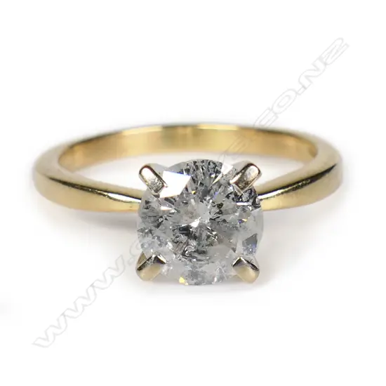 An 18ct gold and diamond solitaire ring,