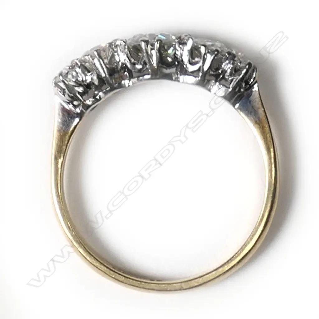 A platinum and yellow gold multi diamond ring, Image 1++