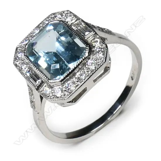 An 18ct white gold, aquamarine and diamond ring,