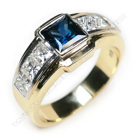 An 18ct yellow and white gold sapphire and diamond ring,