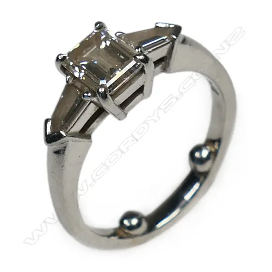A bespoke platinum and diamond solitaire ring,