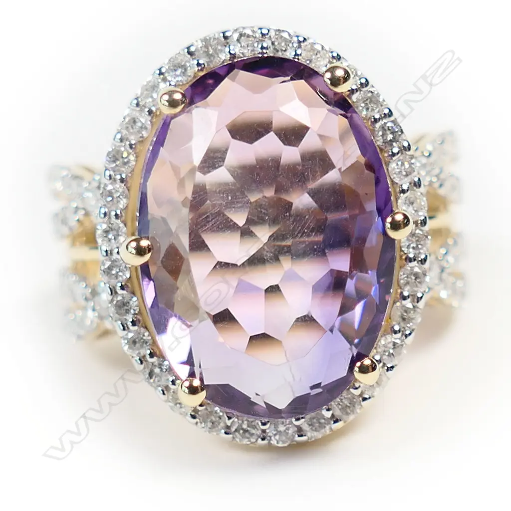A 14ct gold amethyst and diamond cocktail ring, Image 1++