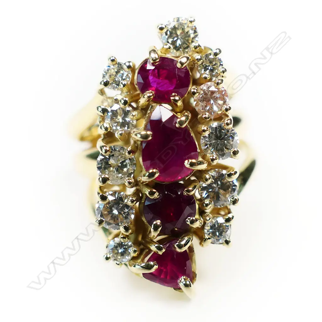 An 18ct gold ruby and diamond ring, Image 1++