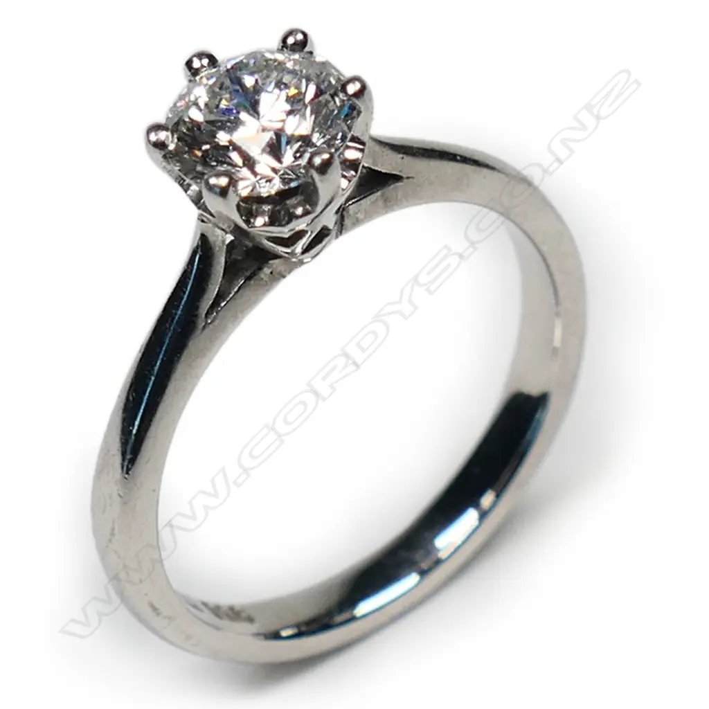 A platinum and diamond solitaire ring, Image 1++
