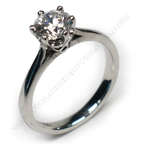 A platinum and diamond solitaire ring,