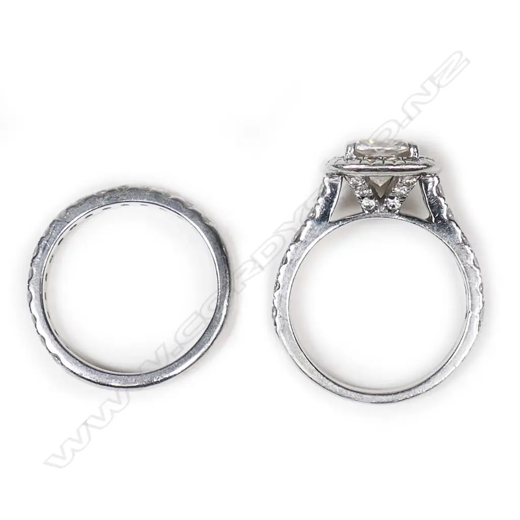 A pair of platinum and moissanite rings, Image 1++