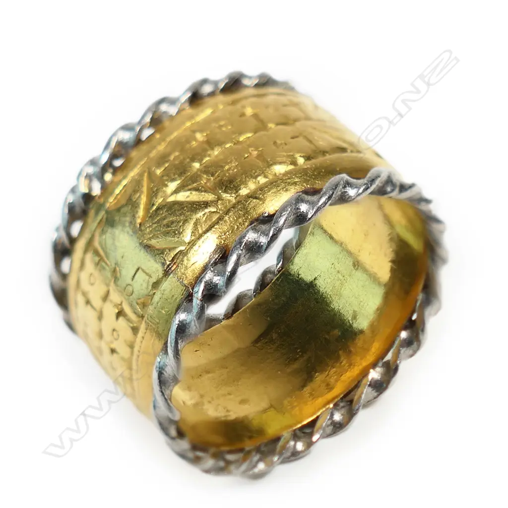 An 18ct gold wide band, Image 1++