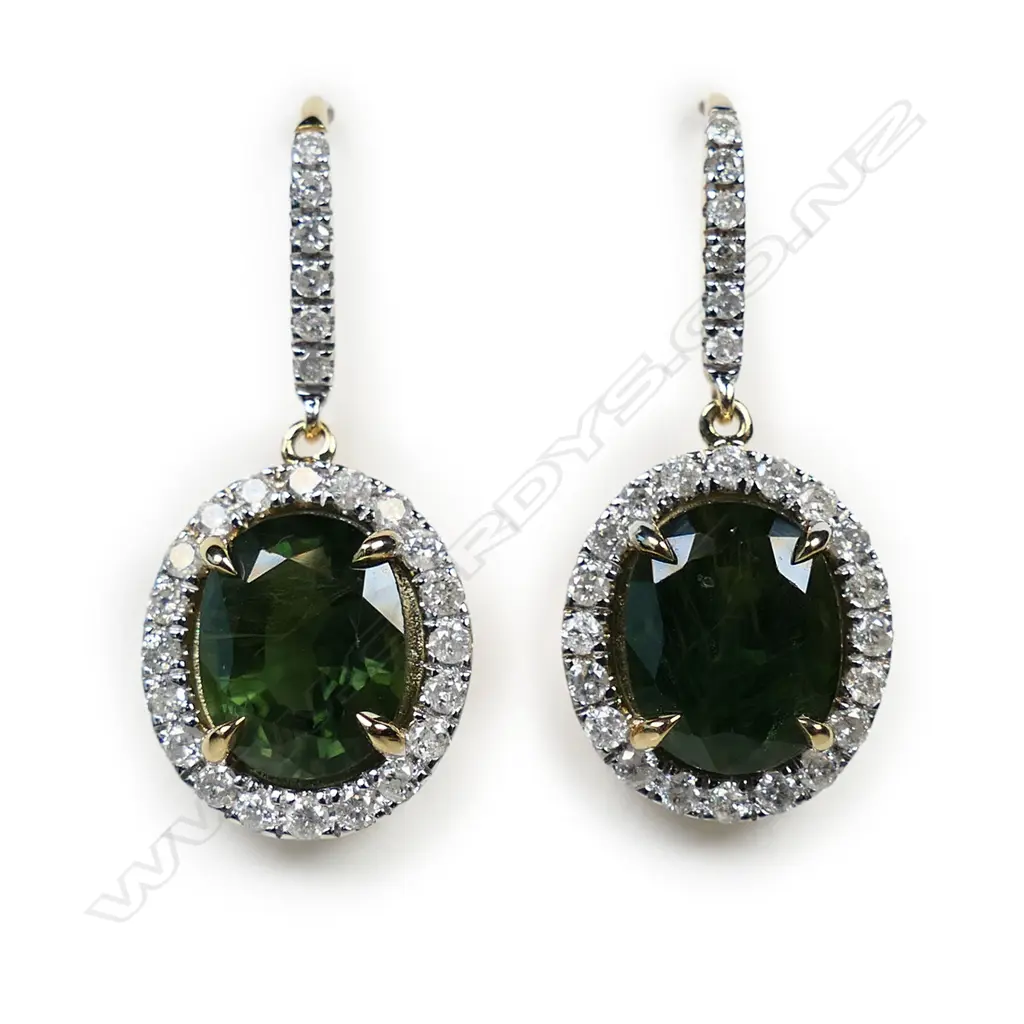 A pair of 14ct gold green sapphire and diamond halo earrings, Image 1++