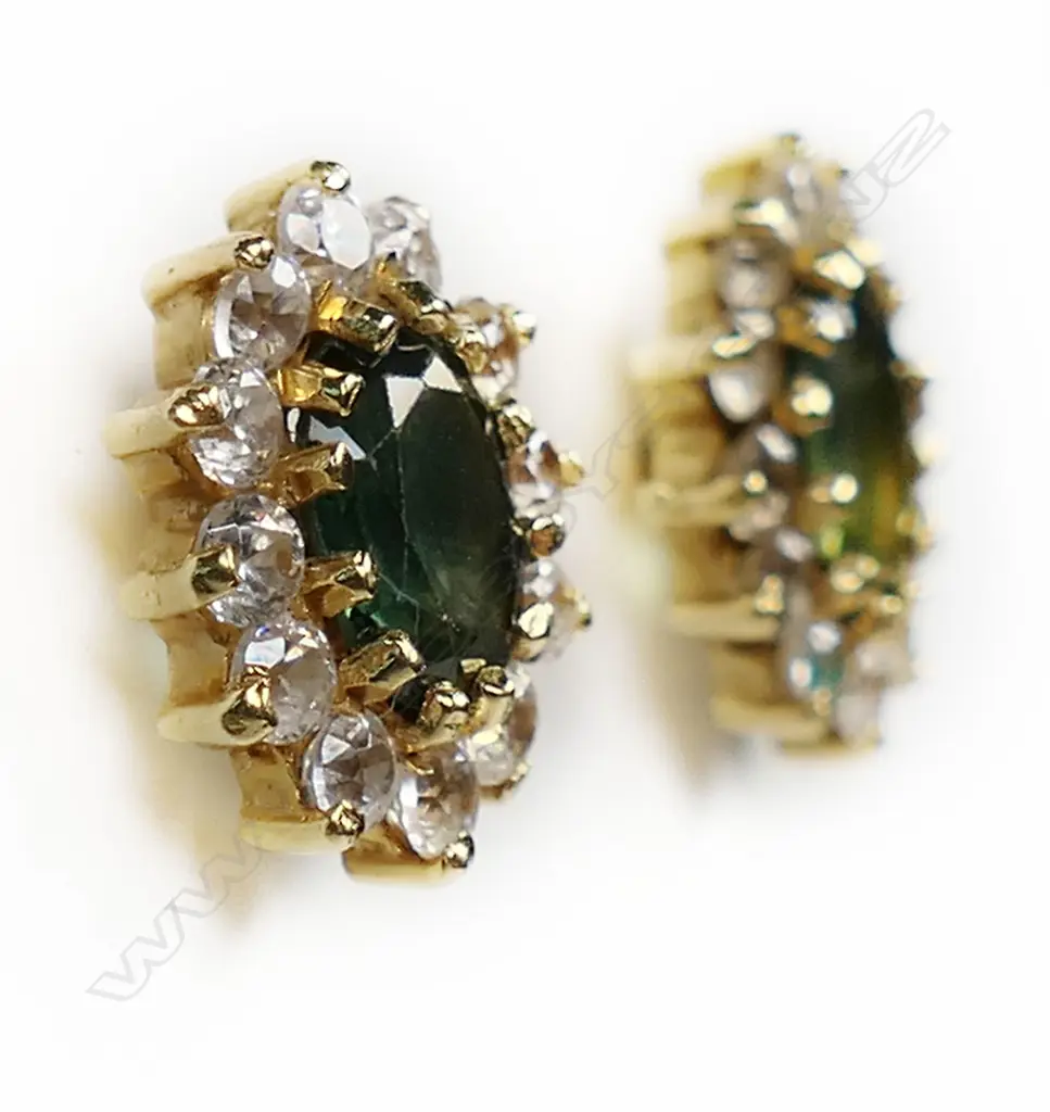 A pair of 18ct gold green sapphire and cubic zirconia halo stud earrings, Image 1++