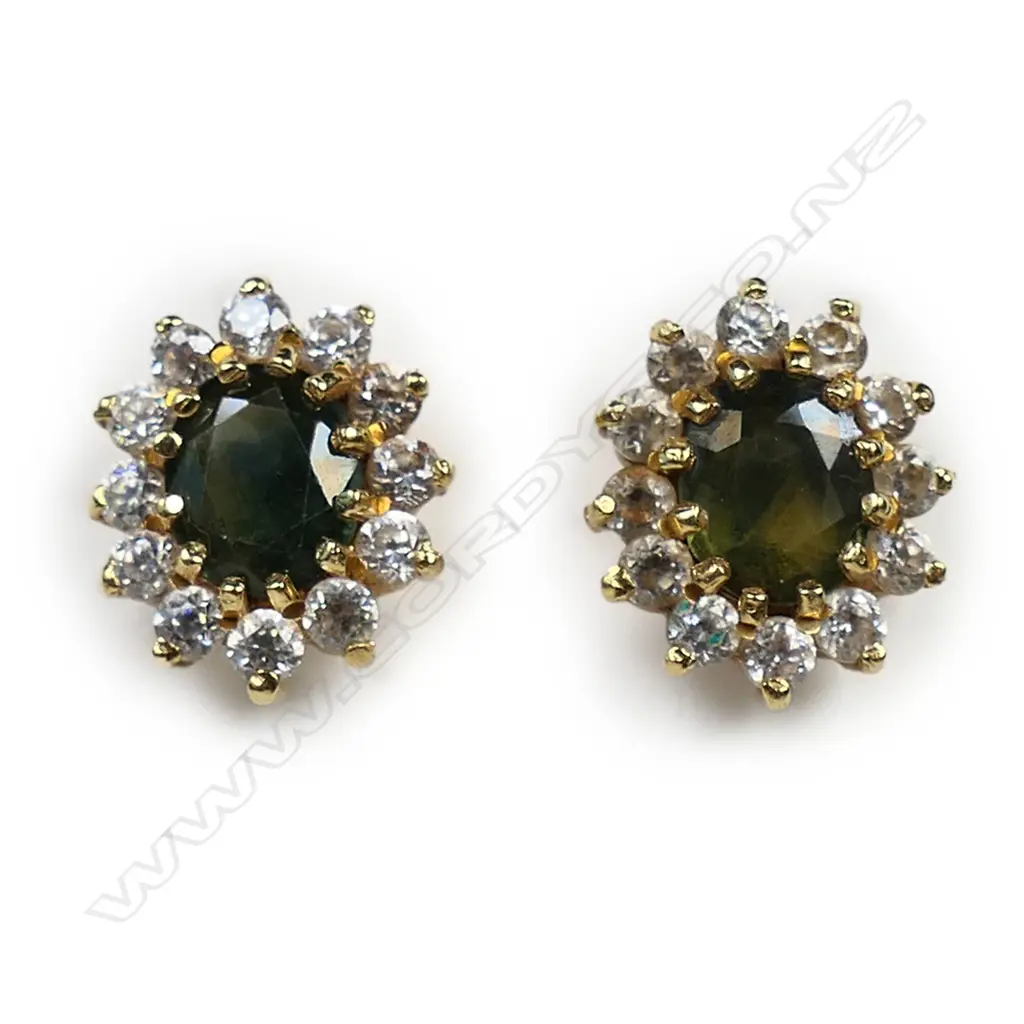A pair of 18ct gold green sapphire and cubic zirconia halo stud earrings, Image 1++