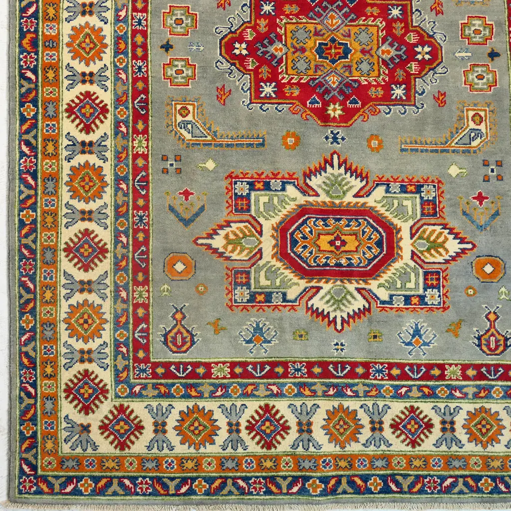 An Afghan Kazak hand knotted wool pile rug, Image 1++