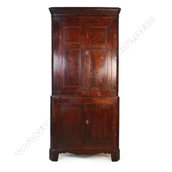 An impressive Georgian oak corner cupboard,