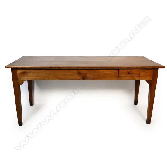 A French provincial style fruitwood dining table,