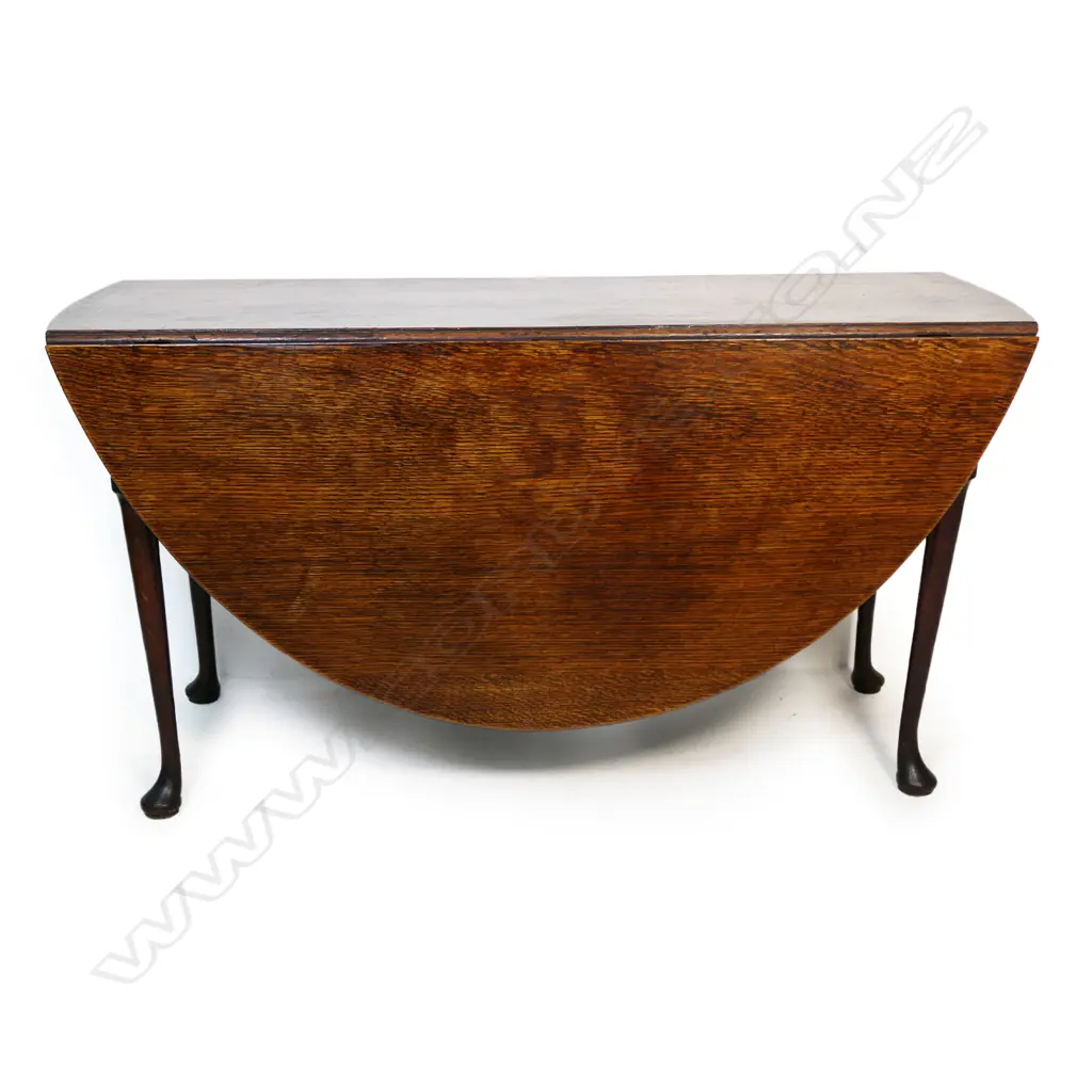 A Georgian oak drop leaf table, Image 1++